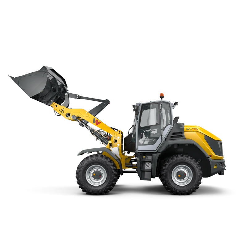 1.5 to 2 cubic yard wheel loader in motion, showcasing robust construction and efficiency for heavy-duty construction and landscaping tasks.