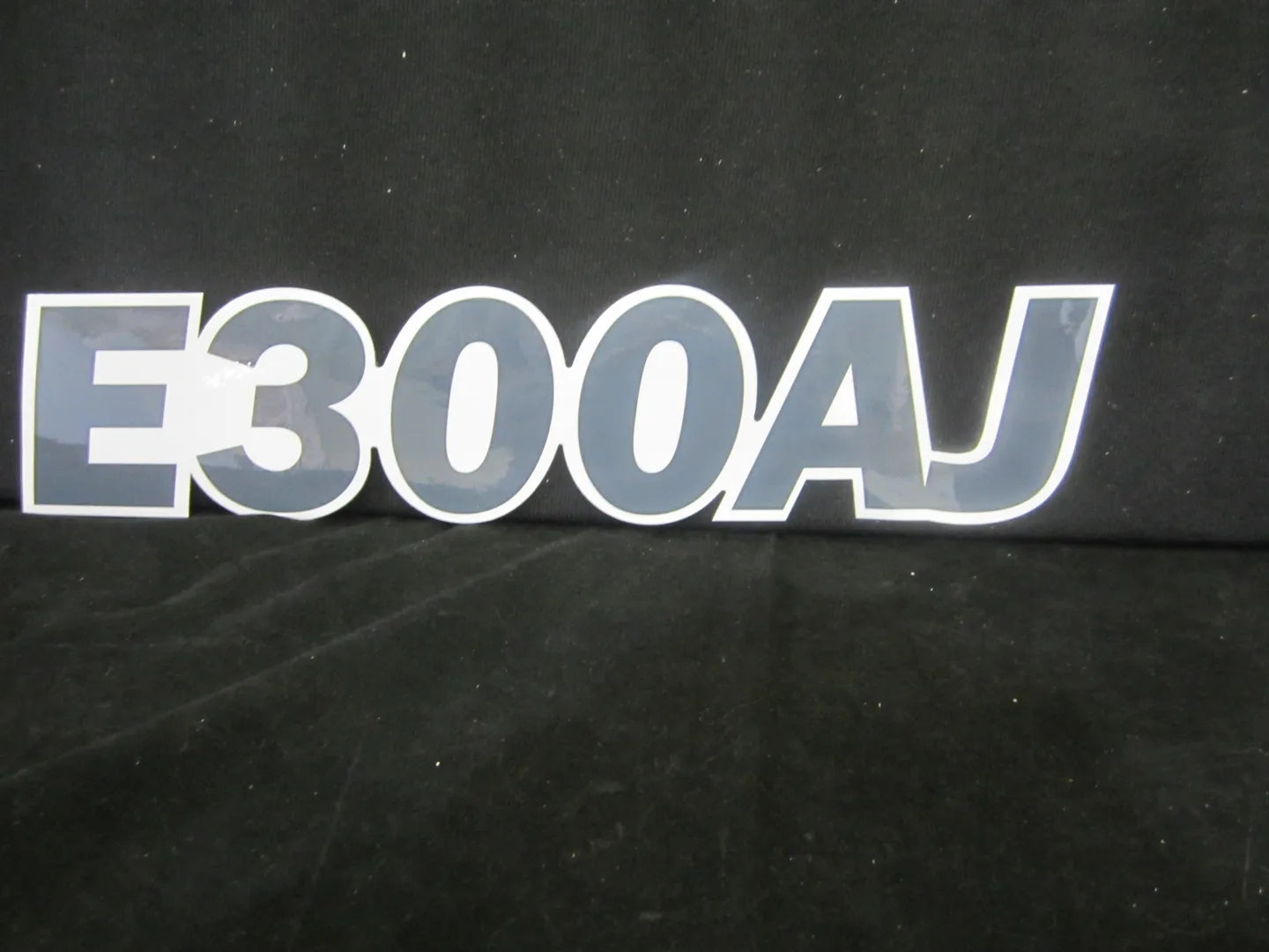 DECAL, MODEL E300AJ