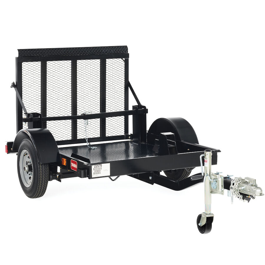 Stump grinder trailer with heavy-duty design and sturdy build, suitable for transporting stump grinding equipment.